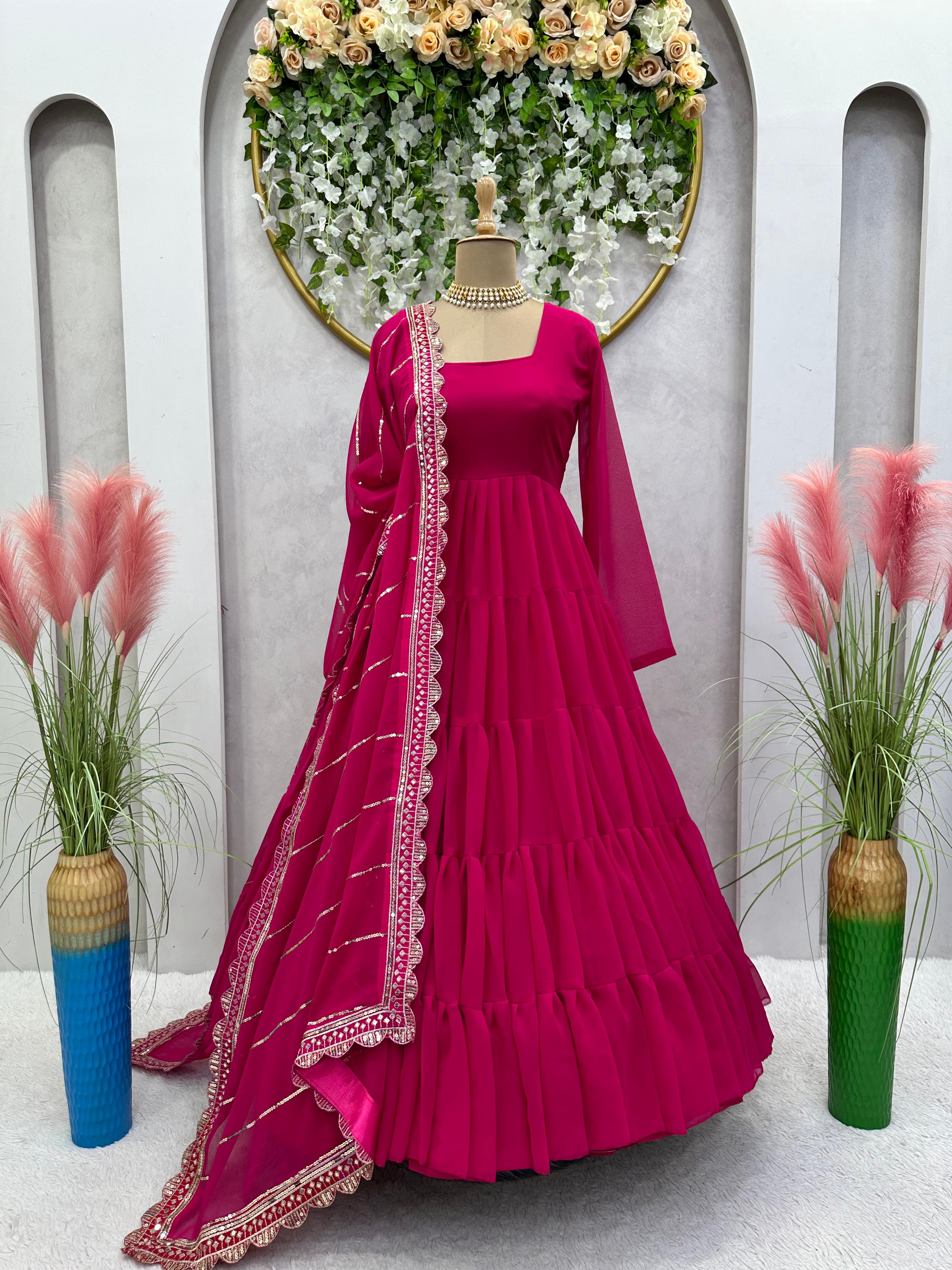 Adorable Ruffle Style Pink Long Gown With Work Dupatta